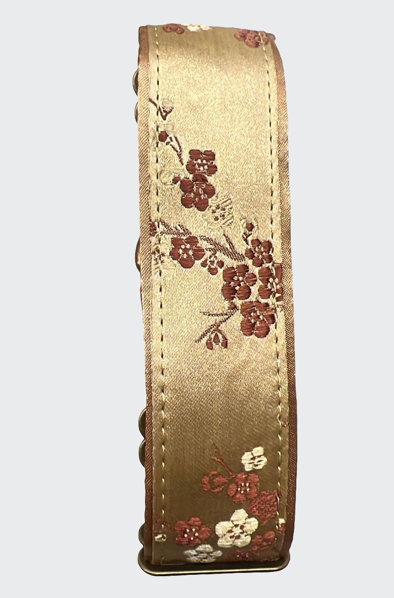 Decorative ribbon with floral pattern on a beige background